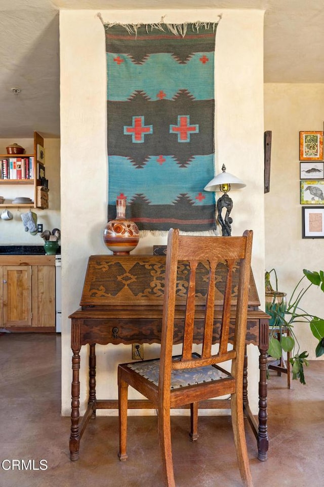 dining area with finished concrete floors