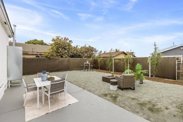 view of patio / terrace featuring a fenced backyard and outdoor dining space