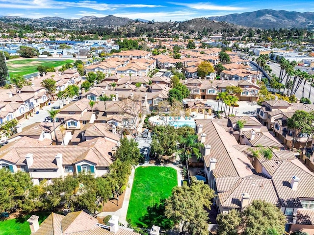 bird's eye view with a residential view and a mountain view