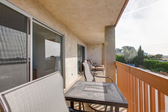 balcony featuring outdoor dining area