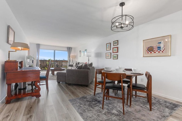 2475 Jefferson, Carlsbad, CA 92008 - dining room featuring light wood finished floors and a chandelier