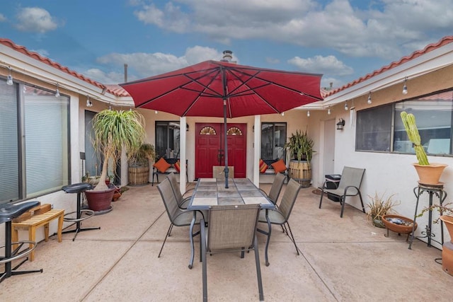 view of patio featuring outdoor dining space