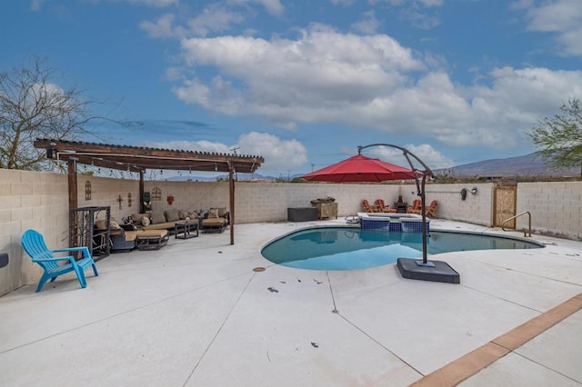 view of pool with a fenced backyard, a patio, and an outdoor hangout area