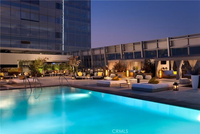 pool featuring a patio area