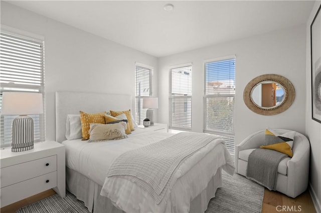 bedroom with light wood-type flooring