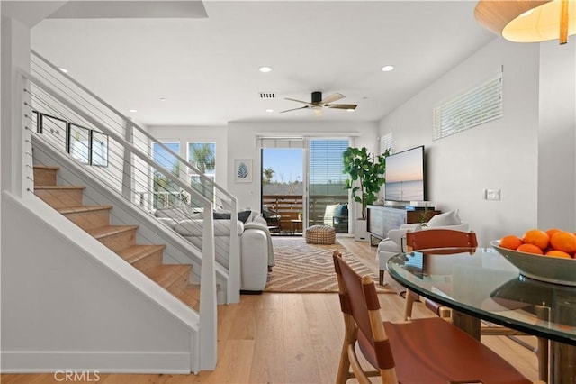 interior space with visible vents, stairway, light wood-type flooring, recessed lighting, and a ceiling fan