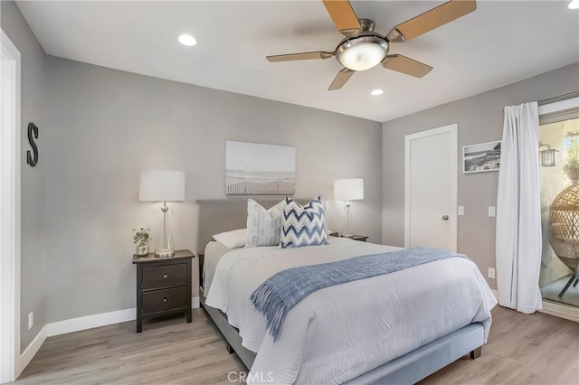 bedroom featuring light wood-type flooring, baseboards, and recessed lighting