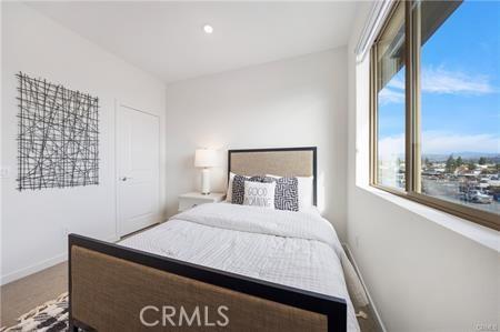 bedroom with recessed lighting and baseboards