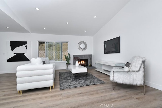 6215 Keystone St, Simi Valley, CA 93063 - living area featuring baseboards, wood finished floors, recessed lighting, and a premium fireplace