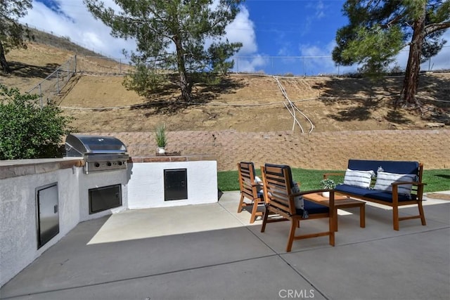 6215 Keystone St, Simi Valley, CA 93063 - view of patio featuring a grill, fence, area for grilling, and outdoor lounge area