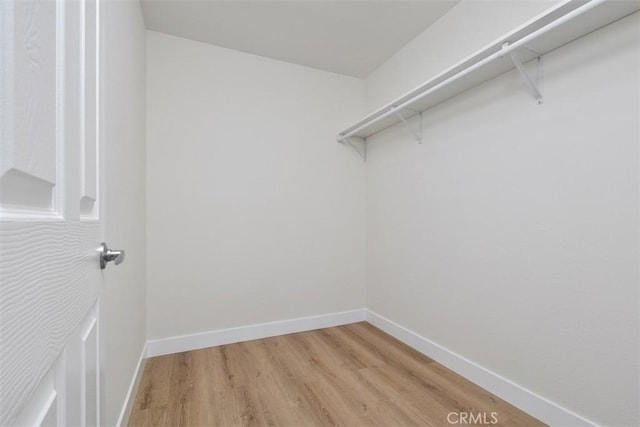 6215 Keystone St, Simi Valley, CA 93063 - walk in closet featuring light wood-style floors
