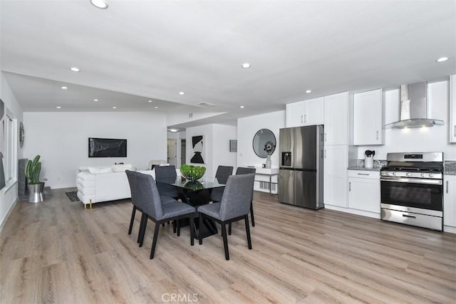 6215 Keystone St, Simi Valley, CA 93063 - dining area with light wood finished floors, recessed lighting, and baseboards