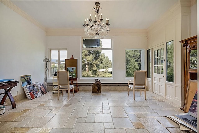 sitting room with a notable chandelier, ornamental molding, and stone tile flooring