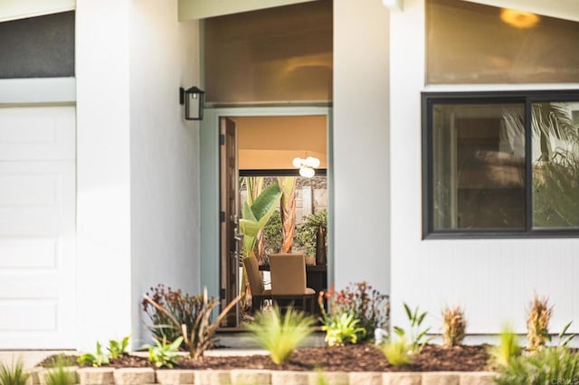 entrance to property featuring a garage