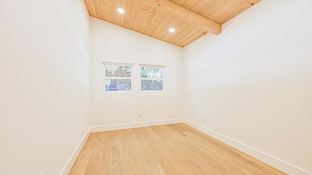 empty room with vaulted ceiling with beams, wooden ceiling, recessed lighting, baseboards, and light wood finished floors