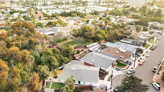 birds eye view of property with a residential view