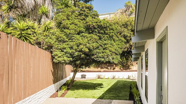 view of yard with fence