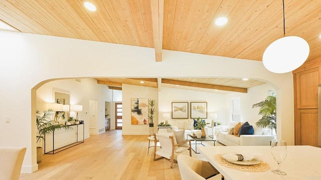 living room featuring arched walkways, vaulted ceiling with beams, recessed lighting, wood ceiling, and light wood-type flooring