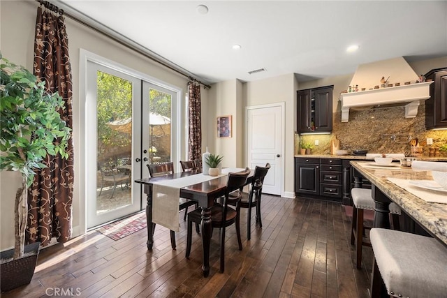 dining space featuring recessed lighting, french doors, visible vents, and dark wood finished floors