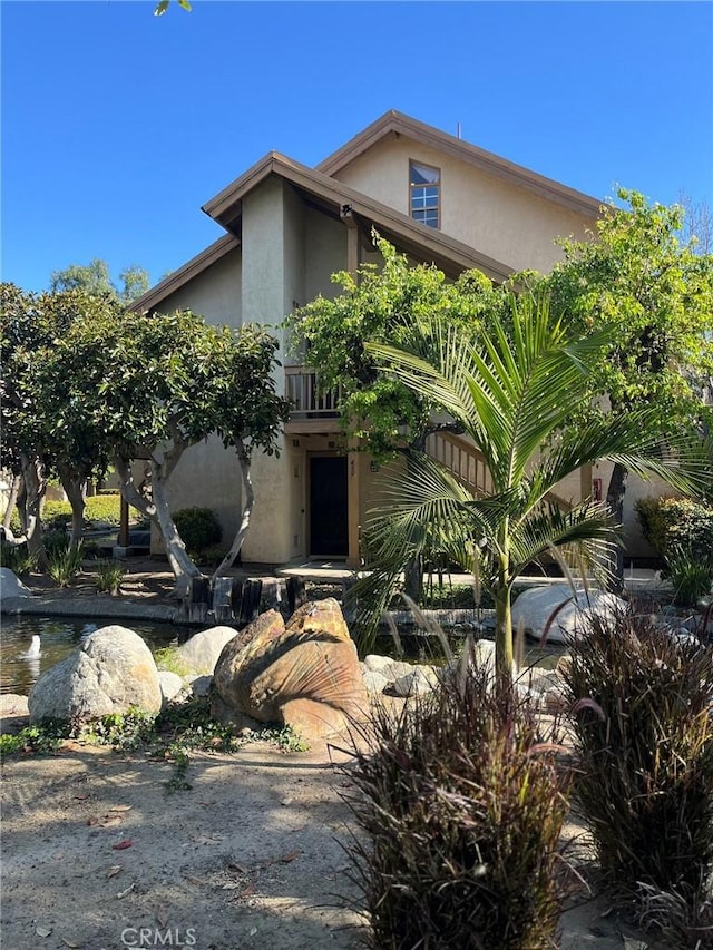 view of front of home with stucco siding