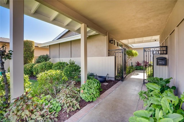 exterior space featuring fence and a gate