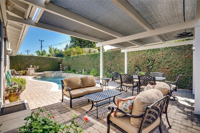 view of patio with a fenced in pool, outdoor dining area, fence, and an in ground hot tub