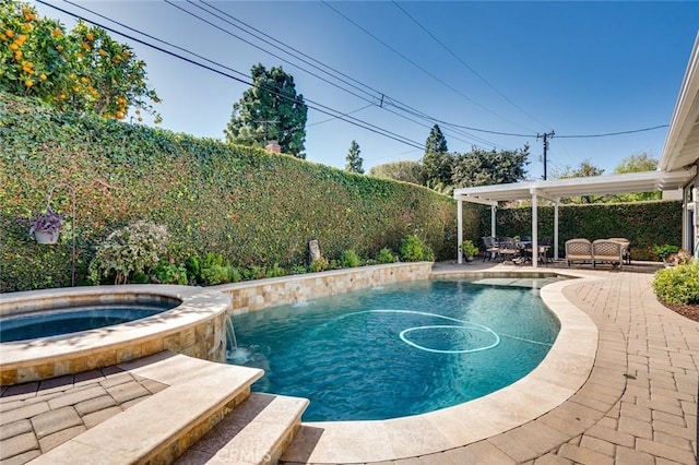 view of pool with a patio area, a fenced backyard, a fenced in pool, and an in ground hot tub