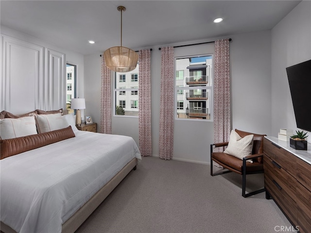 bedroom featuring baseboards, carpet floors, and recessed lighting