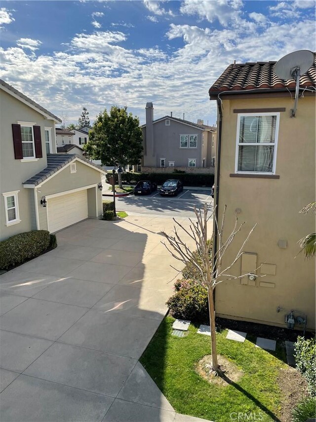 view of street with driveway