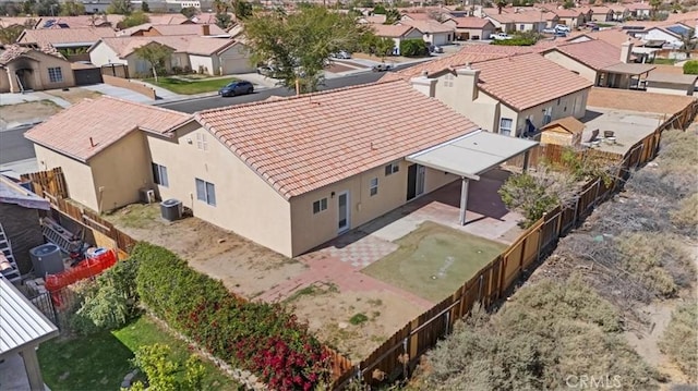 birds eye view of property with a residential view