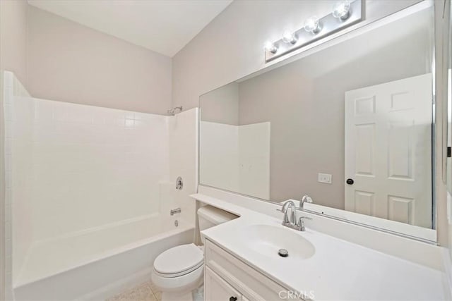 bathroom featuring shower / washtub combination, tile patterned flooring, vanity, and toilet