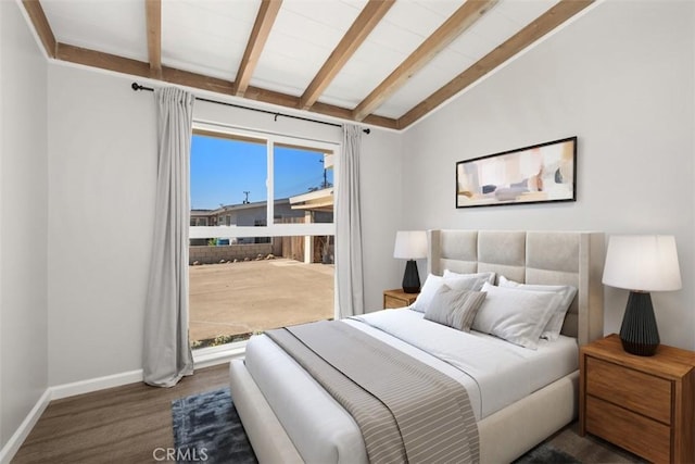 bedroom with vaulted ceiling with beams, baseboards, and wood finished floors