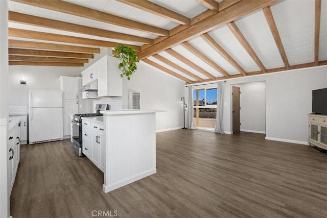 kitchen featuring stainless steel gas stove, open floor plan, freestanding refrigerator, and under cabinet range hood