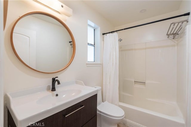 bathroom featuring shower / bath combination with curtain, vanity, and toilet