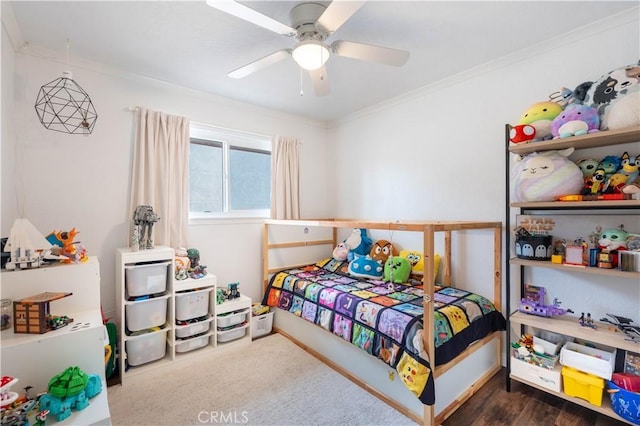 bedroom featuring ornamental molding and a ceiling fan