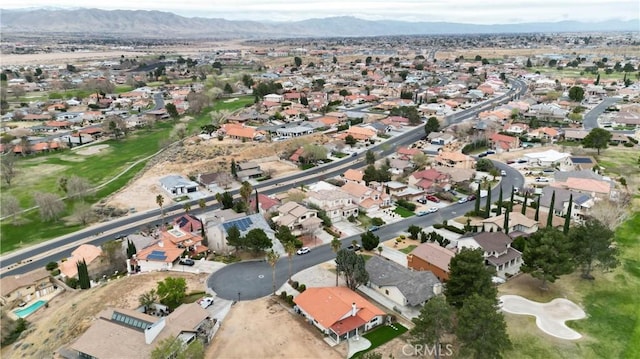 bird's eye view featuring a mountain view and a residential view