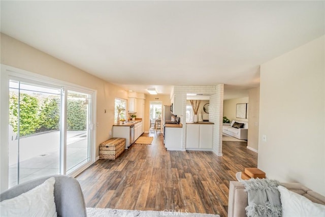 living room with wood finished floors