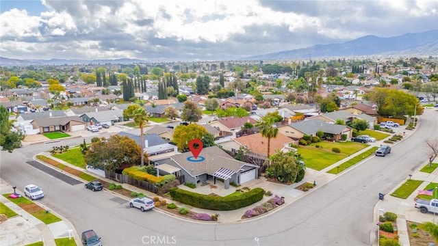 bird's eye view with a mountain view and a residential view