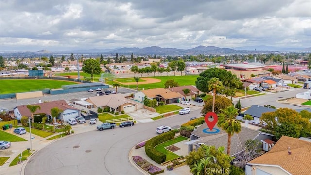 bird's eye view with a residential view and a mountain view