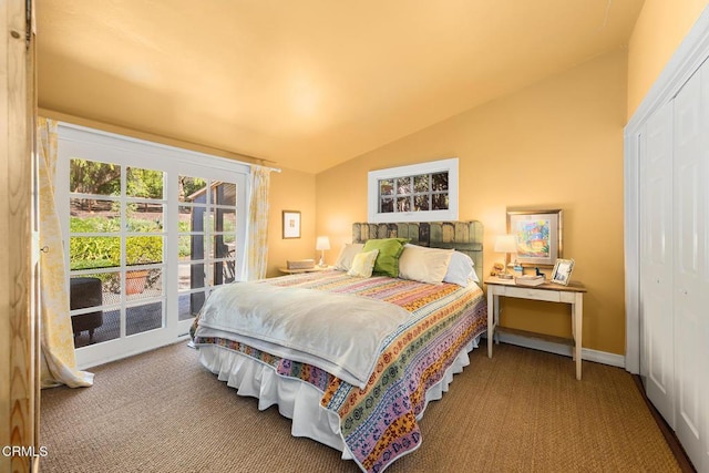 bedroom with access to exterior, baseboards, carpet floors, vaulted ceiling, and a closet