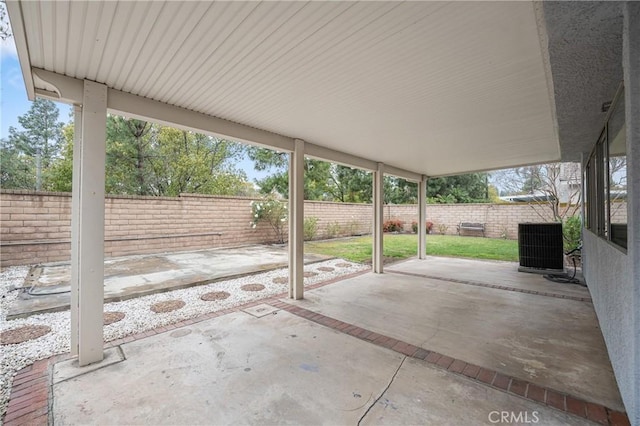 view of patio / terrace featuring a fenced backyard and central AC