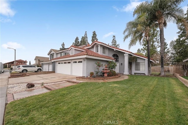 view of front facade featuring driveway, a garage, fence, a front yard, and stucco siding