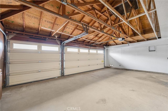 garage featuring a garage door opener