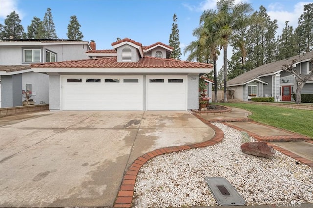 exterior space featuring driveway, stucco siding, a garage, and a tiled roof