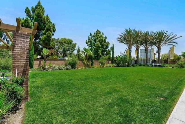 view of yard featuring fence