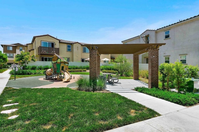 surrounding community with a patio, playground community, fence, a lawn, and a pergola