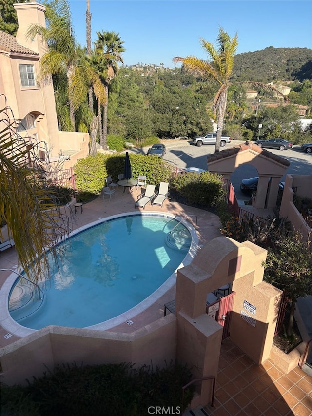 pool featuring a patio area