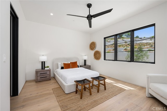bedroom featuring ceiling fan, recessed lighting, and light wood-style floors
