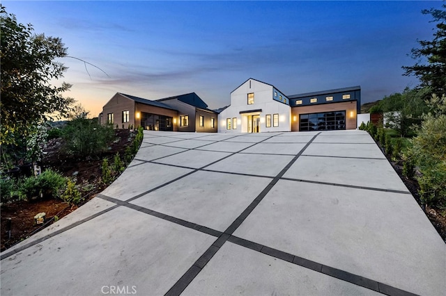 view of front of house featuring a garage and driveway