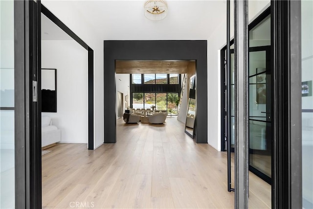 foyer entrance with light wood finished floors